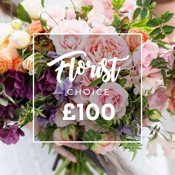 A lush, artisan bouquet is presented as if just gathered from a garden, each bloom layered for texture and emotion. Prominent, dewy pink garden roses, their petals full and ruffled, form the bouquet's soft core; these are offset by dramatic plum or burgundy hellebore-like clusters that add weight and a moody elegance. Interlaced are pale purple-and-white striped sweet peas, their delicate faces and tendrils bringing a whimsically fragile note, while coral and peach ranunculus-style flowers add concentrated bursts of warmth and roundness. Creamy white filler flowers lighten the composition and catch the light, and a varied palette of greens-slender vines, eucalyptus-like sprigs and broader matte leaves-gives the arrangement its relaxed, garden-tied silhouette. Over the floral image, a thin white square frames the words Florist Choice in flowing script, the smaller word CHOICE beneath, and a bold ?100 displayed clearly to show the curated product and price. The bouquet is gently supported from below by visible hands and a faint pale sleeve, the background softened to keep attention on the blooms' detail and colour. The overall impression is intimate, expertly balanced and seasonally inspired-perfect for weddings, anniversaries or a luxurious, personal gift. The scent seems nearly present: a mix of rose sweetness, fresh green notes and that tender green-earth perfume unique to recently cut stems, a style often requested by customers around Golders Hill Park and Finchley Road areas.