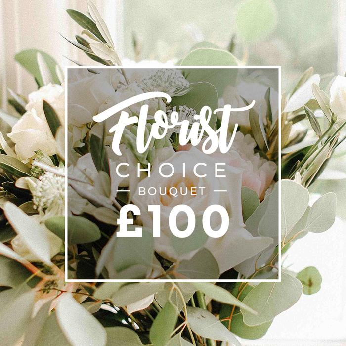 An opulent close-up captures a Florist Choice Bouquet, a premium celebration piece priced at £100, its palette of white and ivory with blush hints reaffirming sophistication. The blooms are full and lush, with garden roses or peonies opening in soft layers, their petals velvety and rich. Interwoven among them are clusters of smaller white blossoms, tempered by generous greenery: rounded eucalyptus leaves in grey-green and slender olive branches that sweep through the arrangement, lending movement and a touch of rustic romance.
Centered over the blossoms is a translucent white square overlay bearing the branding: Florist in an elegant script at the top, CHOICE in clean uppercase, and BOUQUET below with a restrained flourish. The price £100 sits boldly beneath, legible and calm. The bouquet's light surrounds it, softly blurred in the background as if photographed in a sunlit Golders Green studio, a setting that makes every petal glow. This image serves as a premium feature of a bespoke floral product, perfect for weddings, anniversaries, or corporate gifts, crafted to convey luxury, refinement, and dependable freshness. It speaks of the care that goes into selecting stems at Flowers Golders Green and of the ready availability for local delivery across Golders Green, Temple Fortune, and nearby streets, bringing a moment of elegance to the recipient's doorstep.