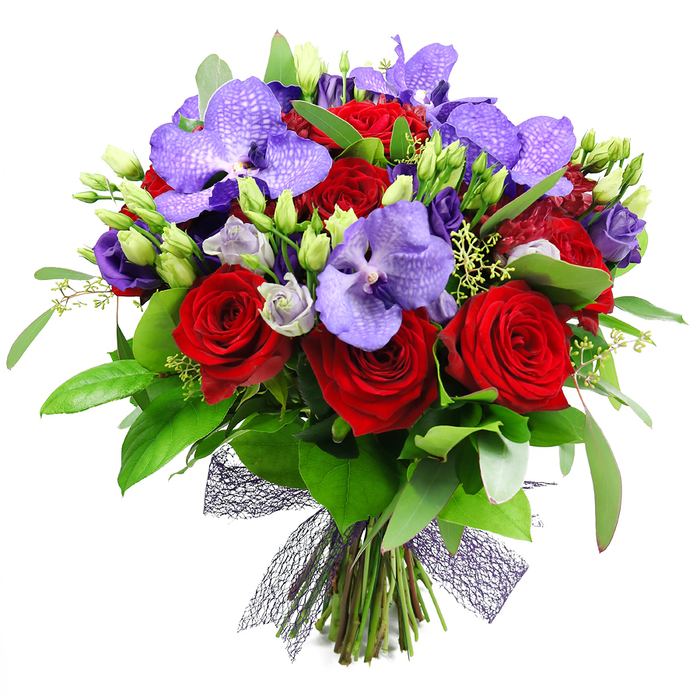 Opulent and sculptural, this bouquet dominates the frame against the pristine white backdrop, a luxury arrangement born in the heart of Golders Green. Deep red roses recline at the center in velvety spirals, their petals rich with romance and refinement, while purple Vanda orchids offer an exotic counterpoint with broad, speckled petals in lavender and violet. Interwoven among them are clusters of smaller lisianthus in soft lilac and indigo, their soft curves lending grace and depth. The arrangement is lush with greenery: broad, glossy leaves provide a dark, lush backdrop, while numerous unopened green buds and slender filler sprigs suggest fresh growth and energy. A decorative, dark ribbon in a mesh weave wraps the base, its almost-black plum tone adding contemporary elegance and texture. This opulent display evokes romance and celebration, a perfect gift for anniversaries or Valentine's Day, and a striking centerpiece for a dinner party or a sophisticated home setting in Golders Green. Created by a local florist who knows the neighbourhood-from Hoop Lane and Golders Green Road to the leafy precincts near Hampstead Garden Suburb-the bouquet carries a sense of place and craft, inviting the recipient to pause and savor the luxury of each bloom. Though the photo conveys a studio stillness, in real life it thrives in a sunlit kitchen or foyer of a Golders Green home, catching the eye of visitors as they pass Hoop Lane. The careful balance of bold red and cool purple makes it a versatile gift for anniversaries, weddings, or a thoughtful gesture to express admiration.