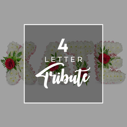 A serene, thoughtfully composed image showcases a four-letter funeral flower tribute in a way that feels both modern and deeply respectful, much like the quiet residential streets surrounding Golders Green station. The background is a smooth expanse of light grey, intentionally understated so that the floral work and message remain the clear focus. In the centre sits a charcoal-toned, semi-transparent square bordered by a slim, clean white frame. Across this soft window of grey, the words "4 LETTER" appear in bright white, upright and confident, while "Tribute" sweeps beneath in a more flowing, script-style font, giving the design a gentle sense of movement, almost like a whispered farewell. Behind this overlay, partially veiled yet still distinctly visible, are four large floral letters crafted from a dense blanket of pure white chrysanthemums. The blossoms sit tightly together, creating a plush, almost cushion-like surface that suggests comfort and peace, akin to the quiet green corners around Golders Hill Park and the surrounding avenues. Along the sides of each letter runs a narrow trim of pale pink ribbon, peeking through the petals as a subtle blush that softens the starkness of the white. Scattered thoughtfully across the letters are bold red roses, each bloom framed by glossy green foliage, their rich crimson tones offering a moving contrast that speaks of lasting love and cherished memories. The composition communicates how a family in Golders Green might choose a custom floral word or name to honour a loved one, showing the balance between personalisation, traditional sympathy flowers, and understated elegance.