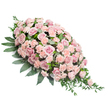 A lush sympathy spray in shades of soft pink rests against a crisp white background, shaped like a gentle teardrop that widens into a generous cluster of blooms before narrowing to a graceful tip. The surface of the arrangement is almost completely covered in flowers, creating a rich, continuous blanket of colour and texture. Large, pastel pink roses are the stars, their velvety petals swirling outward in layered spirals that catch the light with a subtle sheen. Interspersed between them, smaller blush and light peach-pink carnations tumble together, each ruffled head adding depth and a plush, cushion-like softness. The pink tones range from barely-there petal blush to slightly deeper dusty rose, blending seamlessly to form a calm, reassuring palette. Around and beneath this floral canopy, deep green foliage provides both structure and contrast: broad, glossy leaves support the weight of the design, while finer, more feathery greenery filters out along the sides and especially from the pointed end, giving the spray a natural, slightly cascading movement. Everything is lit evenly, so the intricate details of each bloom and leaf are clearly visible, yet the arrangement still feels gentle and restful. One can imagine this tribute placed on a casket in a Golders Green service or laid beside a grave after a ceremony near the local crematorium, the quiet colours and fresh fragrance offering solace to family and friends. The careful craftsmanship shows a florist's understanding of how flowers can wrap a moment of farewell in grace, respect, and enduring affection.
