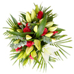 A carefully composed sympathy bouquet seen from just above, its rich shapes and tones arranged into a generous, mounded form on a clean white ground. At the heart of the tribute are a dozen deep, velvety red roses-each fully opened to reveal layered, soft petals that read as a quiet, solemn punctuation across the composition. Interwoven with those roses are numerous white and cream lilies: many are long, pale yellow-green buds with smooth tapered tips that hold the promise of opening, while one immaculate lily towards the lower right has unfurled into a trumpet of pure white, its pale yellow stamens visible and lending a gentle sculptural core. The blooms sit within an abundant framework of foliage-a mix of broad, glossy dark green leaves that provide weight and structure, long spiky palm fronds fanning outward to soften the silhouette, and small clusters of silvery, rounded eucalyptus leaves that add a cool matte texture and visual depth. The overall palette of deep crimson, creamy white, soft yellow-green and verdant foliage conveys respect, remembrance and calm; under soft, diffuse light the arrangement reads as comforting rather than ostentatious. A trained florist's hand is evident in the deliberate spacing and mixed textures, intended to offer solace at a funeral or memorial setting. I picture it placed near a chapel lectern or on a side table at a small service in Golders Green, where its quiet elegance would speak of sympathy and support without words.