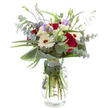 Immerse yourself in the serene sophistication of this Golders Green-inspired bouquet, masterfully arranged by local artisans at Flowers Golders Green. Each element is thoughtfully chosen to reflect both vibrancy and tranquillity, with deep red roses unfurling their plush petals at the centre-a classic gesture of affection. Radiating outward, crisp white Gerbera daisies introduce brightness and clarity, each blossom standing out with immaculate white petals and a rich brown centre. Blushing Lisianthus in light purple-a few open, some barely whispering their arrival-bring an air of gentle optimism. The composition is given structure and freshness by a tapestry of greenery: cool eucalyptus leaves, softly silvered and round, weave among broad, glossy foliage that supports and frames the flowers above. One aspidistra leaf, lustrous and graceful, curves elegantly at the base, evoking the modern spaces and artistry found along Golders Green Road. White clusters of spray flowers add fullness, their tiny petals adding grace and texture. All is held together in a sparkling clear glass vase, the stems visible and immersed in water-a testament to the bouquet's vibrant freshness. Whether gracing the table for a celebration in Hampstead Garden Suburb or sending joy to loved ones across Golders Green, this arrangement brings brightness and refined beauty to every occasion, its colours and gentle scents reminding one of peaceful mornings in nearby parks.