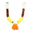 A vibrant, U-shaped decorative garland is photographed against a clean white studio background, every curve and texture shown with careful clarity. Beginning at the top of each arm are tightly clustered creamy white florets - soft, almost downy petals that read like miniature chrysanthemums or small carnations - their pale tone lending a quiet, ceremonial air. Below these white caps the garland changes to a rich, reddish-brown band: flattened, layered elements that catch the light with a subtle, matte sheen and suggest the warm grain of mahogany or terracotta-hued dried petals. As the arms sweep downward this warm middle register gives way to a broad, cheerful band of golden yellow. These dense, fluffy yellow pieces mimic marigolds (genda phool) in both colour and volume, their rounded pom-pom shapes creating the main U-shaped silhouette that feels generous and festive. Small bright green accents punctuate the joins between colour blocks, like tiny leaves or ribbon knots that provide visual breathing space and a hint of fresh contrast. At the lowest point, where the two curves meet, a voluminous pendant of ruffled orange petals hangs as a focal bloom - layered, multi-tonal and very much the eye-catcher, reminiscent of auspicious marigold clusters used in puja and wedding decor. The overall impression is one of tradition and endurance: an artificial toran crafted to look lush and tactile, perfect for doorways, altars or temple entrances in Golders Green homes and community spaces. Under soft studio lighting the surfaces read as silk-like and textured; a decorative piece that signals welcome, celebration and devotion in familiar South Asian festivals such as Diwali, Ganesh Chaturthi, Onam or Pongal.