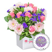 Presented in a crisp white cube vase, this bright baby-girl bouquet pairs a vibrant pastel arrangement with a playful lavender Mylar balloon. The bouquet centers on several full pink roses, their petals unfurling in soft, romantic spirals, mingled with light pink gerbera daisies that showcase white-edged petals and pale yellow centers. Interspersed are clusters of delicate purple filler flowers-statice or limonium-which punctuate the display with bold, candy-toned accents, while airy white spray chrysanthemums add texture and fullness. Lush green foliage threads through the blooms, giving the arrangement a fresh, garden-like feel. The white vase is pristine and modern, its front panel adorned with a delicate pink script reading It's a Girl, complemented by a tiny red ladybug motif that evokes good luck and joy for a new arrival. To the lower right, a round lavender balloon features a sweet illustration of a sleeping baby resting on a fluffy cloud, with the words It's a Girl displayed in a soft decorative font. This complete gift set radiates warmth and anticipation, perfect for a newborn welcome or baby shower, and ideal for sending to new parents across Golders Green and nearby districts. It combines tender pink tones with gentle purples and fresh greenery, delivering a heartfelt message of congratulations for a precious little one, while ensuring same-day delivery across Cricklewood, Temple Fortune, and Hendon when time matters.