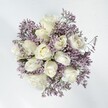 This bouquet evokes calm and optimism-a harmonious blend of creamy white roses, each velvety bloom unfolding gently, cradled by ethereal sprigs of lavender statice. The roses' soft hearts open gracefully, reflecting the tranquil energy of Golders Green's tree-lined avenues. Delicate statice weaves around the roses like perfume on a cool spring breeze, their papery lavender florets offering both visual and tactile contrast. The entire composition, bathed in gentle natural daylight, exudes purity and quiet hope, making it the ideal floral gift for Golders Green weddings, anniversaries, or moments of heartfelt significance. There's a softly powdery fragrance, understated yet evocative of dew-laden mornings near Childs Hill Park. This bouquet represents sincerity and lasting affection, lovingly arranged by a local florist attuned to the nuanced emotions of Golders Green's diverse community. Every detail speaks of thoughtful composition, inviting the recipient to pause, breathe in peace, and feel cherished. Whether for comfort, celebration, or everyday beauty, this arrangement brings a soothing, gentle radiance to life in NW11.