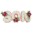 A carefully composed, three-dimensional memorial piece spells the word SON in large capital letters, photographed against a clean white background that makes every detail stand out. Each letter - the S, the O and the N - is densely formed from small, fluffy white spray chrysanthemums, their cloud-like petals packed tightly to create a soft, even surface that reads as both tender and restful. Along the outer edge of every letter runs a scalloped trim of bright red satin ribbon, pleated to give a crisp, folded border that frames the white blooms and lends the composition a measured dignity. Three individual spray clusters break the white field with quiet punctuation: the S carries a cluster on its upper left curve, the O bears one tucked into its lower centre, and the N is touched with a cluster at its upper right. Each accent grouping is composed of velvety deep-red roses, slender spires of blue-purple Liatris (or similar spike flowers), and rich, dark green foliage including delicate fern fronds and trailing leaves that soften the geometry. The contrast of pure white chrysanthemums, red satin edging and concentrated red-and-purple accents reads as a classic sympathy palette - purity, love and lasting remembrance - suited to a funeral, wake or graveside service. Imagined in the quiet light of a chapel or at Golders Green Crematorium, this bespoke tribute carries the hands-on care of a seasoned florist, the faint scent of chrysanthemums and roses, and the calm authority of traditional condolence design intended to comfort family and friends while honouring the memory of a beloved son.