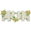 A long, horizontal funeral flower tribute in the image spells out the word MUM in striking, upright block letters, carefully arranged against a stark white background that enhances its clarity and poise. Each letter is entirely covered with tightly massed white spray chrysanthemums, their small, rounded blooms forming a soft, continuous blanket of white that suggests stillness and serenity. The petals catch the light in gentle highlights and shadows, giving the surface a subtle, quilted effect. Around the outer edges of the letters, a darker green framework or ribbon can be glimpsed, hinting at the sturdy, professional construction needed to keep the tribute secure during transport to a service in or around Golders Green. Adding a tender touch of colour, three matching clusters of roses in soft peach and blush pink are placed with deliberate care: one rests at the upper left of the first M, another is tucked into the base of the U, and the third sits on the upper right of the second M. These roses, some tightly furled and others gently opening, are nestled among sprigs of fern and glossy green foliage that bring depth and a garden-fresh feel, reminiscent of the calm, leafy edges of Golders Hill Park. The combination of pure white chrysanthemums and warm-toned roses gives the tribute a quietly emotional presence, perfectly suited to a funeral or cremation where family and friends gather to say goodbye to a cherished mother. This arrangement feels deeply personal, conveying love, respect, and a gentle promise of remembrance long after the service has ended.
