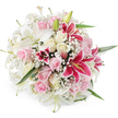 A full, dome-shaped bouquet of mixed lilies, roses, and baby's breath is presented against a pure white backdrop, giving the impression of a carefully composed studio shot from a skilled Golders Green florist. In the foreground, large white lilies open in generous trumpets, their satin-like petals curving back to reveal pale green throats and soft yellow stamens, suggesting a lightly perfumed scent. Nestled amongst them, clusters of blush pink roses and creamy ivory roses create a romantic tapestry of soft colour, each bloom at a slightly different stage, from tight central buds to open, layered blossoms that invite the touch. Standing out boldly, several rich fuchsia and magenta Oriental lilies punctuate the bouquet, their petals patterned with darker speckles and framing vivid stamens that become natural focal points. Between these statement blooms, fine sprays of white baby's breath weave delicately, giving the design a feathery, cloud-like texture and emphasising its lush fullness. Green lily leaves and hints of rose foliage emerge here and there, providing contrast and suggesting the bouquet has been freshly hand-tied rather than overly structured. Even, bright lighting highlights the interplay of smooth petals, tiny star-shaped gypsophila flowers, and glossy greenery, ensuring every detail is clearly visible. The overall feeling is one of warmth and celebration, perfect for sending love to someone in NW11, whether it's a romantic surprise to a home off Golders Green Road, a congratulatory gift near Brent Cross, or a thoughtful gesture delivered to a family gathering close to Golders Hill Park. The bouquet conveys elegance, joy, and heartfelt sentiment in one abundant arrangement.