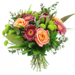 A striking mixed bouquet fills the frame against a bright white background, its colours and structure shown in clear detail as though lit by soft daylight streaming into a Golders Green studio. Several large roses take centre stage, their petals layered in generous spirals of peach, apricot and soft coral, with subtle shifts of tone from pale, almost creamy outer edges to deeper, glowing centres. Framing these are Gerbera daisies in sumptuous shades of burgundy and deep magenta, each bloom composed of fine, ray-like petals radiating from darker, textured centres that lend depth and sophistication suited to an elegant dinner table near Brent Cross or a cosy living room off Golders Green Road. Rising above the softer forms is a dramatic King Protea, its bold, cone-like head built from overlapping bracts of maroon and dusty rose, the pointed tips lightly brushed with blush pink, giving the bouquet a sculptural, almost architectural focus. Dotting the arrangement are multiple clusters of lime-green button chrysanthemums, their neat, rounded heads providing playful pops of vivid colour and a pleasing, tactile texture. Around and beneath the blooms, a generous collar of greenery creates a lush frame: wide, polished leaves offer a strong base, slender green blades add line and movement, and silvery eucalyptus sprigs with rounded leaves soften the outline and suggest a cool, refreshing aroma. The stems are gathered and tied neatly, clearly presented as a professional hand-tied design ready to slip into a vase. This abundant bouquet radiates easy celebration and heartfelt warmth, ideal for same-day delivery across Golders Green, Hampstead Garden Suburb and surrounding NW11 streets for birthdays, anniversaries or thoughtful get-well wishes.